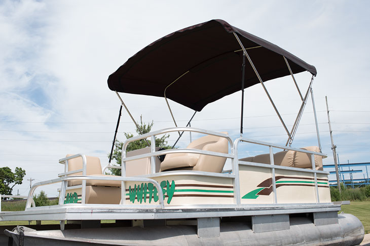 Completed 3-Bow Bimini top on a pontoon boat.
